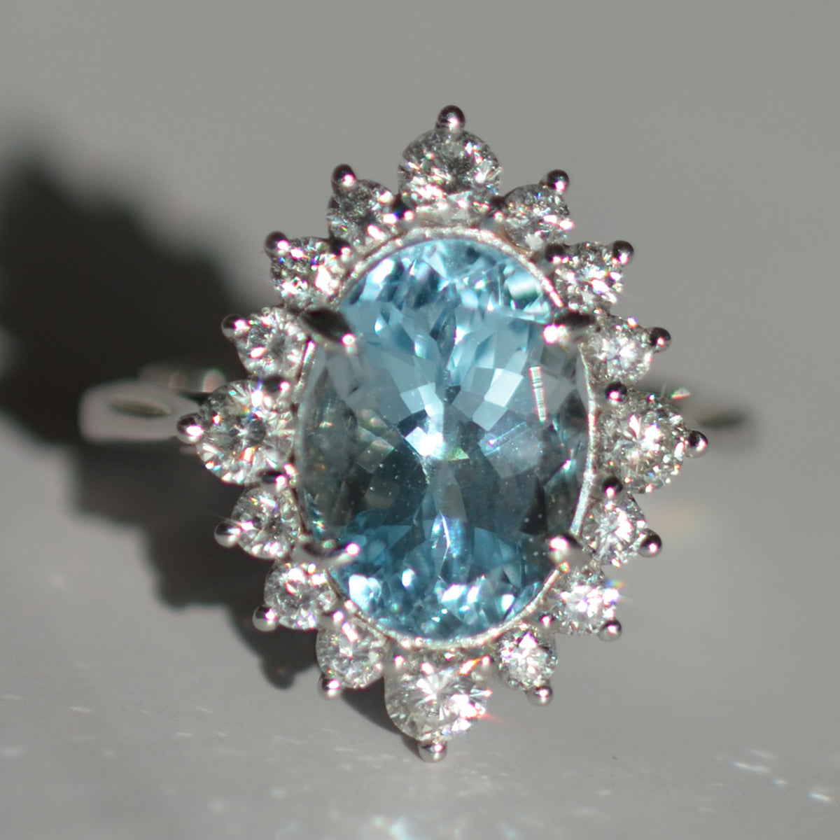 18ct White Gold Aquamarine & Diamond Oval Cluster Ring