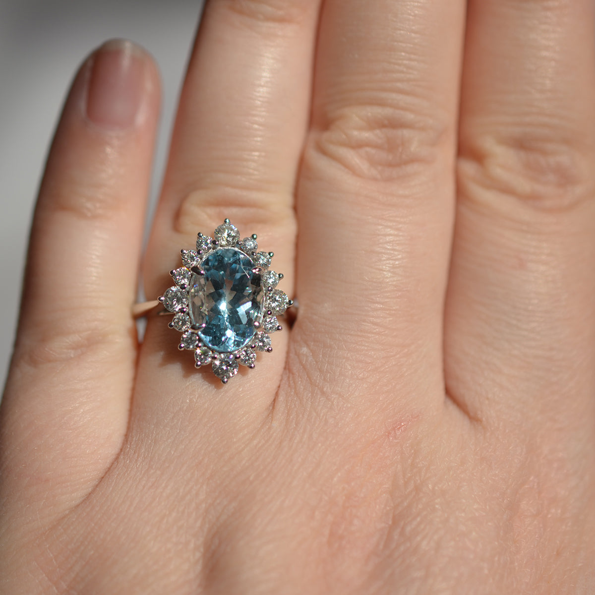 18ct White Gold Aquamarine & Diamond Oval Cluster Ring