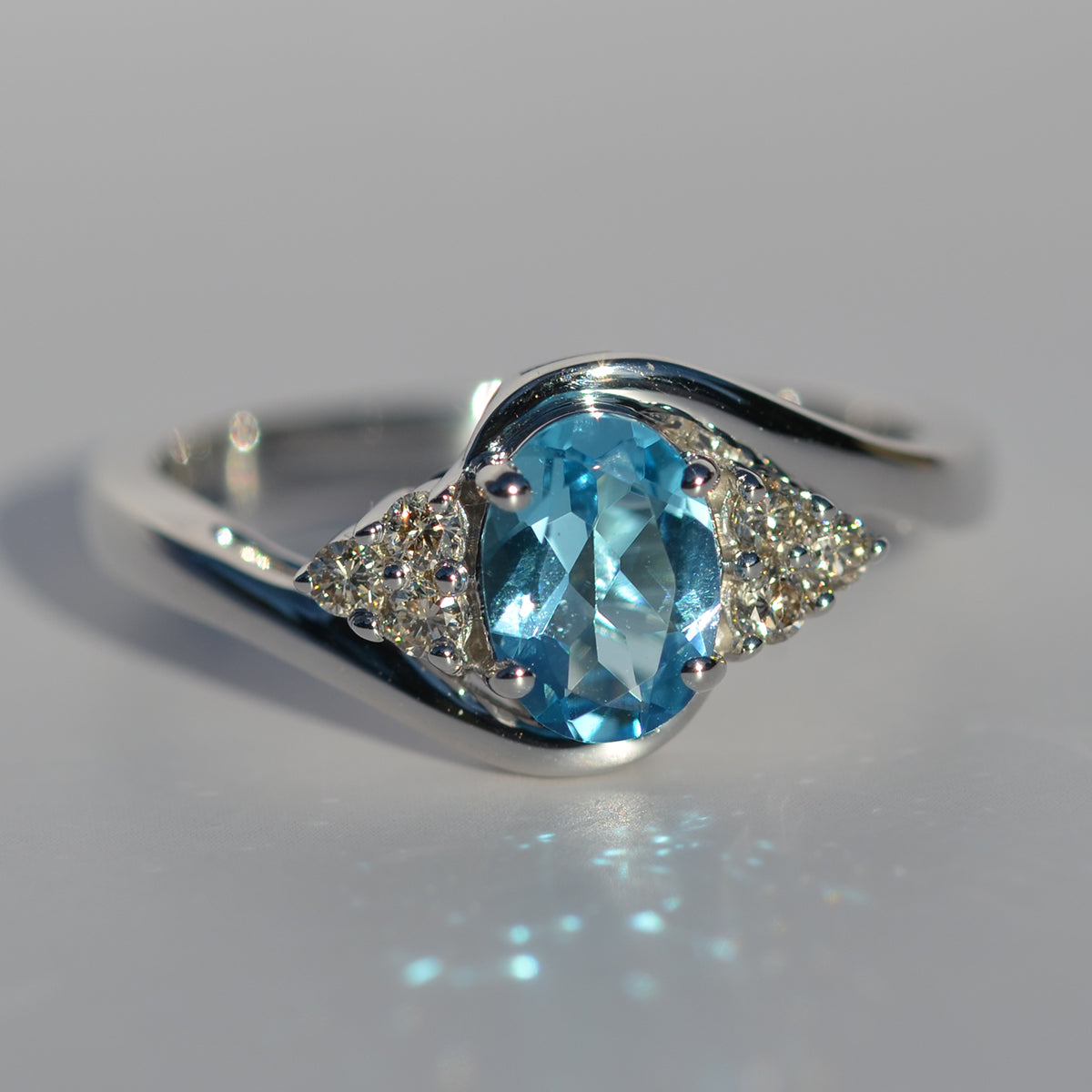 9ct White Gold Blue Topaz & Diamond Ring