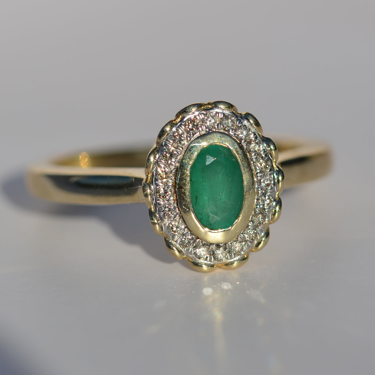 9ct Yellow Gold Emerald & Diamond Oval Cluster Ring