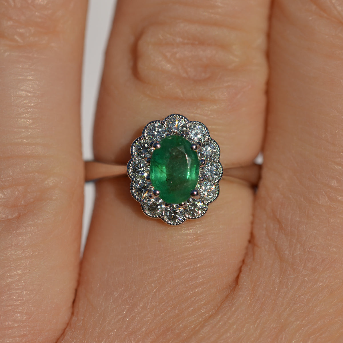 18ct White Gold Emerald & Diamond Oval Cluster Ring