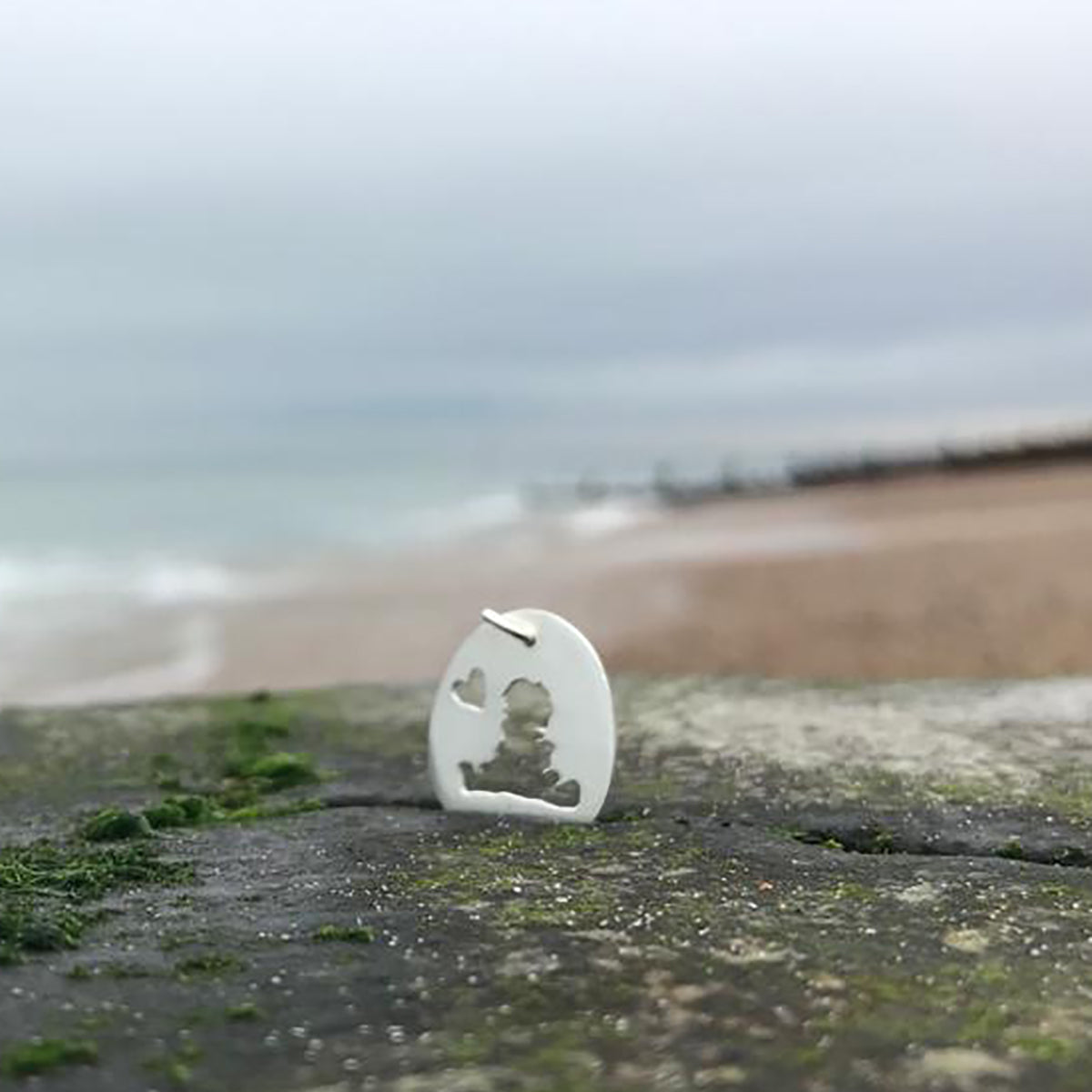 Handmade Silver Small Oval Cutout Hayling Island with Heart Pendant